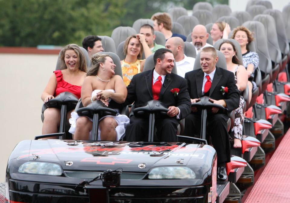 Virginia couple Glen and Wendy Delp Swearengin, front row, ride the Intimidator roller coaster in 2011 at Carowinds after their wedding.