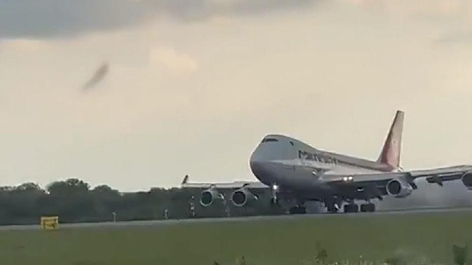 A dramatic emergency landing Sunday caught on video shows part of a plane's landing gear snap off during touchdown in Luxembourg on Sunday, May 14, 2023. The plane was bound for Chicago.