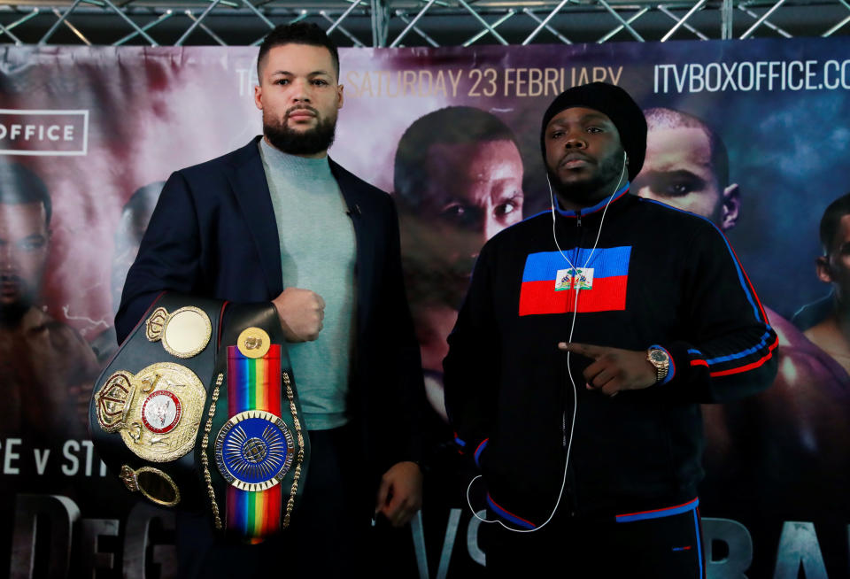 Joe Joyce and Bermane Stiverne pose during a news conference at The O2 in London on Feb. 20, 2019. (Reuters)