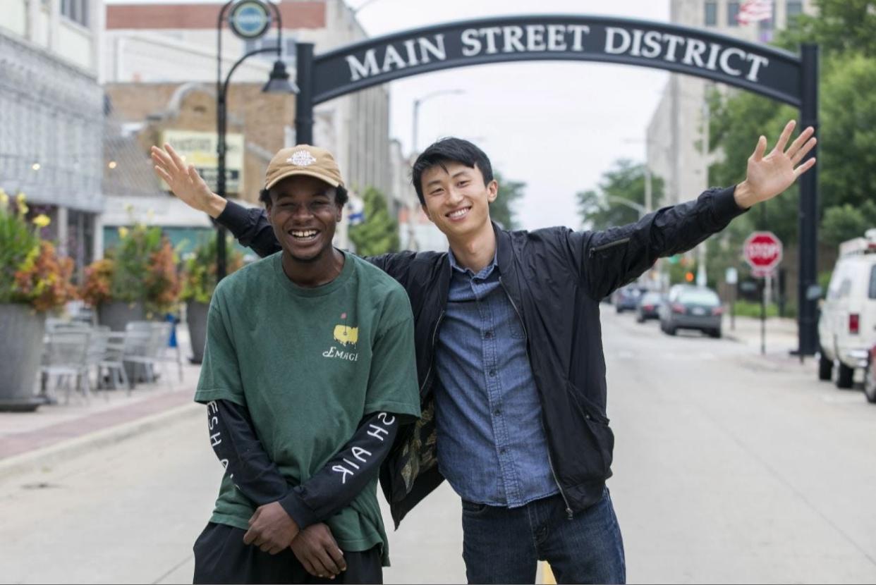 Keire Johnson, left, and "Minding the Gap" director Bing Liu, right, pose for a photo on Aug. 24, 2018, outside the Nordlof Center in downtown Rockford.