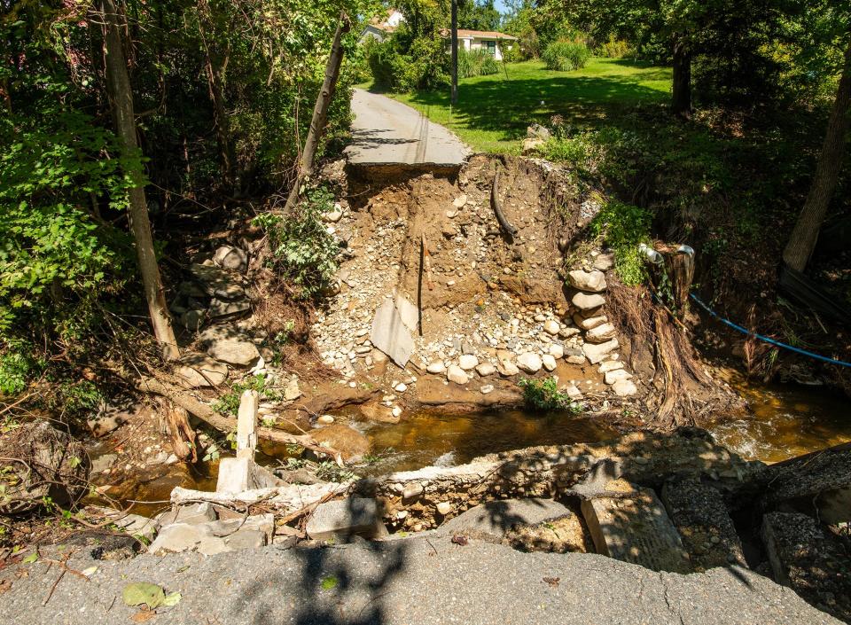 A small bridge that connected three homes to Exchange Street collapsed during the flash flood that hit Leominster Monday.