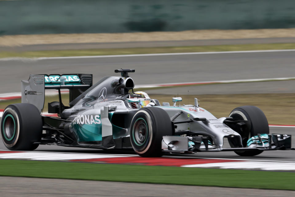 Mercedes driver Lewis Hamilton of Britain steers his car during a practice session ahead of Sunday's Chinese Formula One Grand Prix at Shanghai International Circuit in Shanghai, China, Friday, April 18, 2014. (AP Photo/Alexander F. Yuan)