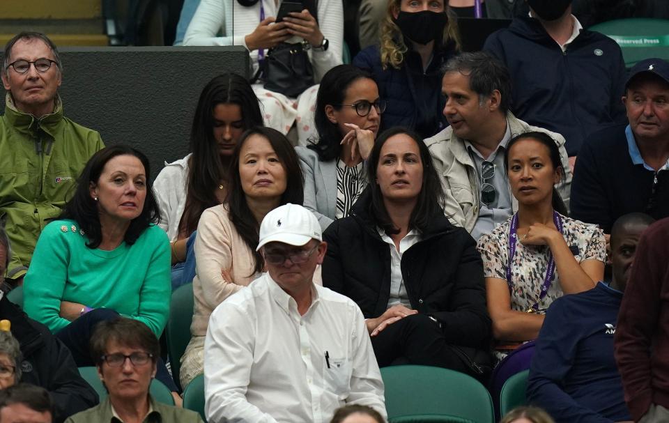 Renee Raducanu (second left) and Anne Keothavong (right) in the stands watching Emma Raducanu against Ajla Tomljanovic (PA)