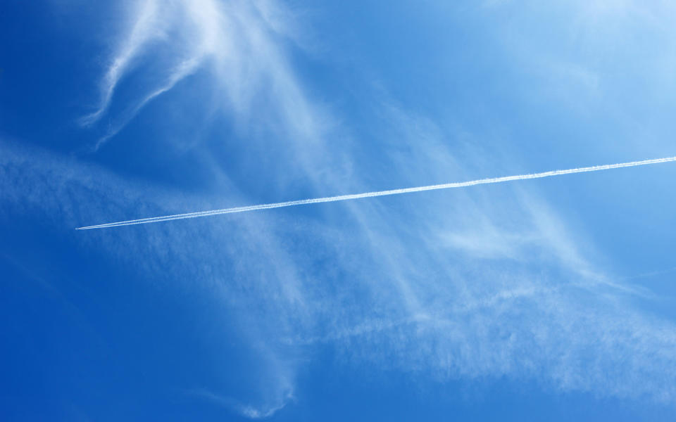 <p>Those white lines that <a rel="nofollow noopener" href="http://www.travelandleisure.com/articles/airplane-cloud-trails" target="_blank" data-ylk="slk:planes leave in the sky;elm:context_link;itc:0;sec:content-canvas" class="link ">planes leave in the sky</a> are simply trails of condensation, hence their technical name of “contrails.” Plane engines release water vapor as part of the combustion process. When that hot water vapor is pumped out of the exhaust and hits the cooler air of the upper atmosphere, it creates those puffy white lines in the sky. It’s basically the same reaction as when you see your breath when it’s cold outside.</p>