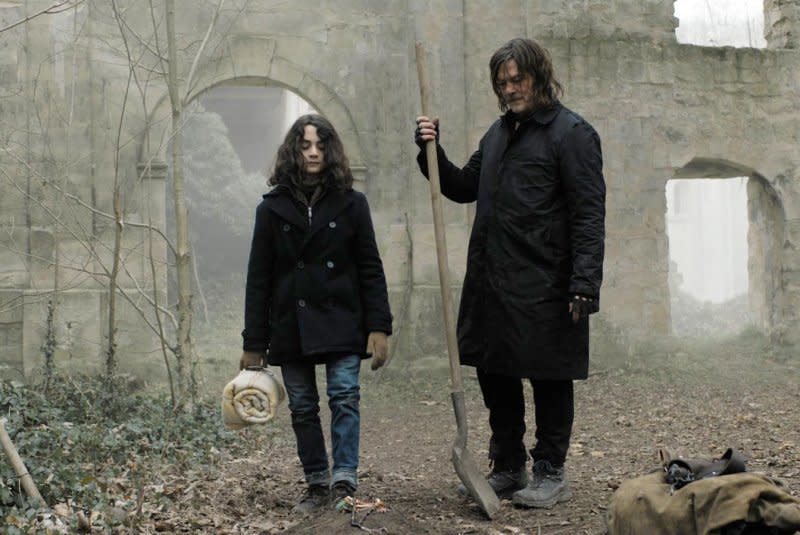 Louis Puech Scigliuzzi (L) and Norman Reedus wander the French apocalypse. Photo courtesy of AMC