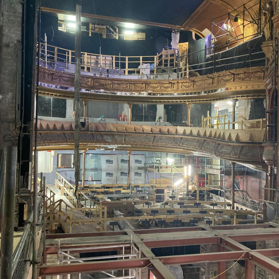 Interior of the Citizens Theatre showing all levels with scaffolding up around the building and seating and orchestra pit ripped out to be replaced