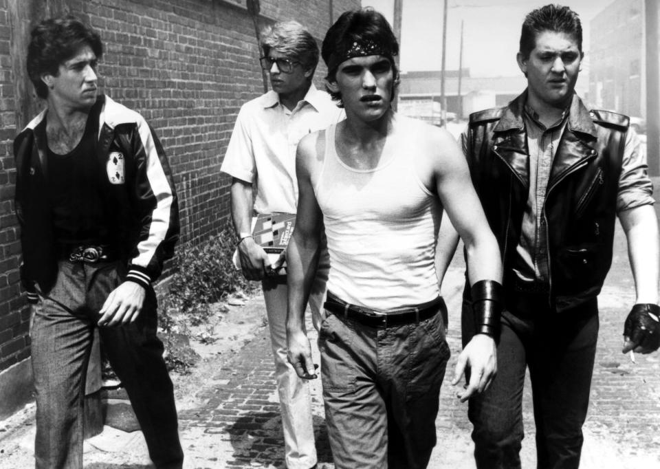 Nicolas Cage, Vincent Spano, Matt Dillon, Christopher Penn walking together.