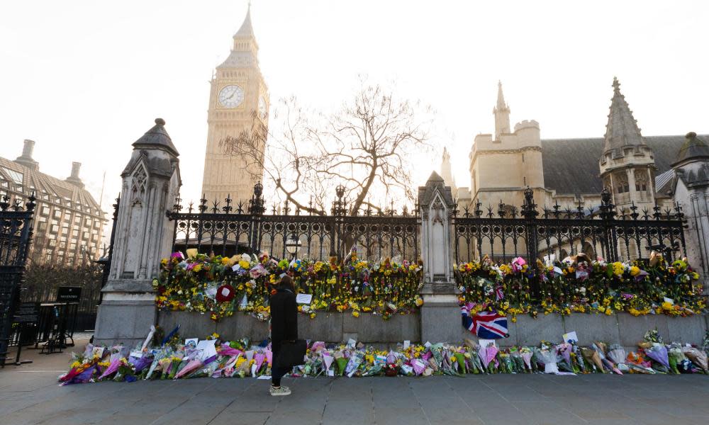 Tributes laid at Westminster for those killed or hurt in the attack, including for PC Keith Palmer, stabbed inside the palace grounds. 