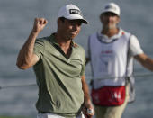 Viktor Hovland, of Norway, celebrates after winning the Hero World Challenge PGA Tour at the Albany Golf Club, in New Providence, Bahamas, Sunday, Dec. 5, 2021.(AP Photo/Fernando Llano)