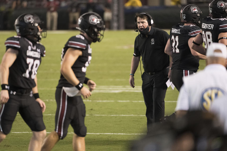 South Carolina coach Will Muschamp shouts to players during the second half of the team's NCAA college football game against Tennessee on Saturday, Sept. 26, 2020, in Columbia, S.C. Tennessee won 31-27. (AP Photo/Sean Rayford)
