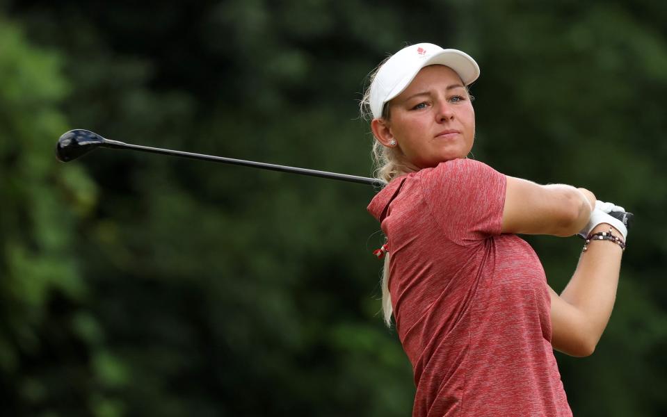 Emily Kristine Pedersen of Team Denmark plays her shot from the sixth tee during the final round of the Women's Individual Stroke Play on day fifteen of the Tokyo 2020 Olympic Games at Kasumigaseki Country Club on August 07, 2021 in Kawagoe, Japan. - Chris Trotman/Getty Images