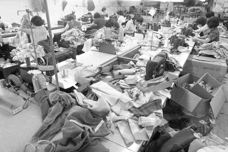 Women Sewing Clothes In Chinatown (Bettmann Archive/Getty Images file)