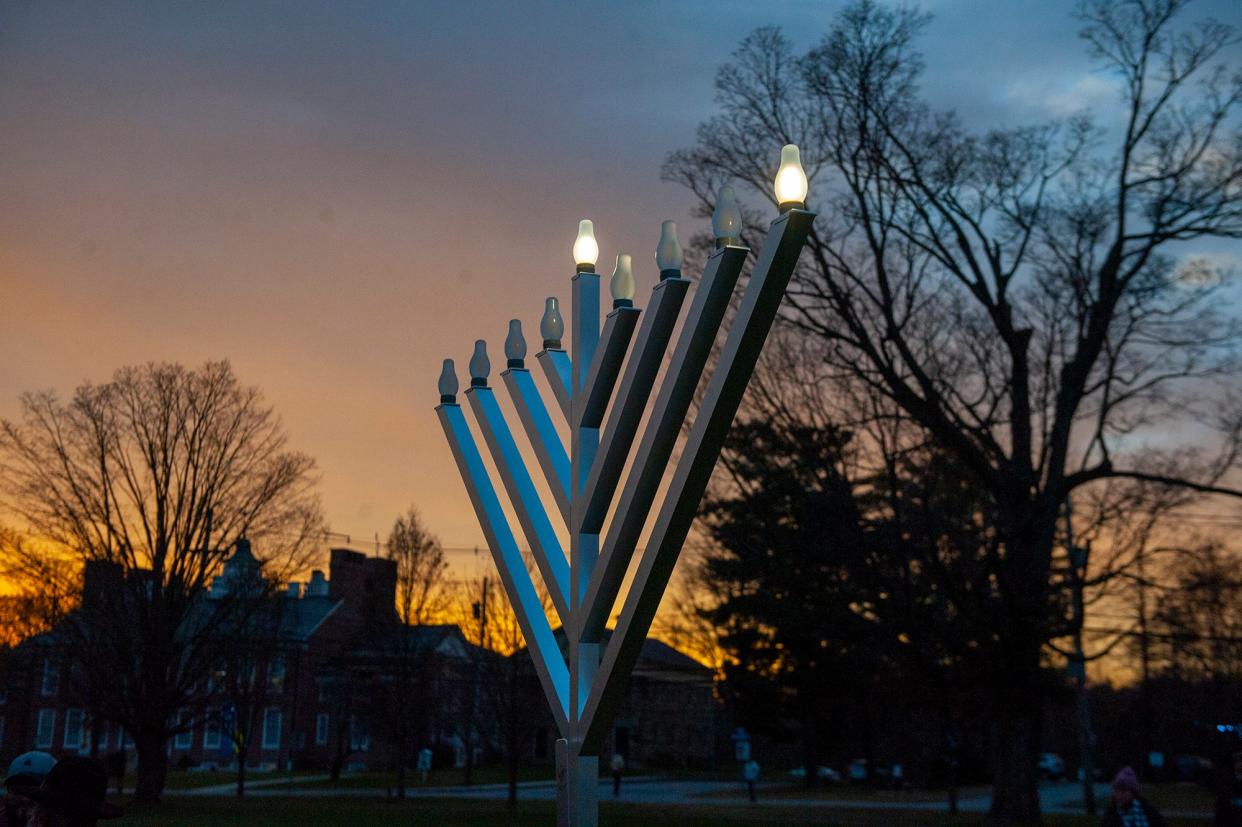 This menorah, shown during on the first night of Hanukkah on the Framingham Centre Common, was vandalized, according to police.