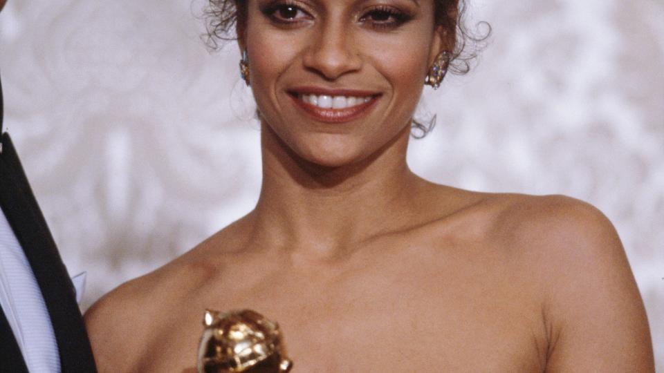 American actress, singer, dancer and choreographer Debbie Allen attends the 40th Annual Golden Globe Awards, held at the Beverly Hilton Hotel in Beverly Hills, California, 29th January 1983. Allen is holding the Best Actress in a Television Series (Musical or Comedy) award, won for her performance in 'Fame'. (Photo by Michael Montfort/Michael Ochs Archives/Getty Images)
