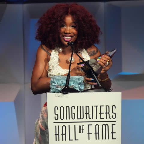 <p>Bennett Raglin/Getty</p> SZA