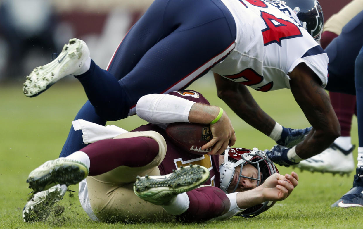 Washington Redskins quarterback Alex Smith suffered a season-ending injury on Sunday against the Houston Texans. (AP)