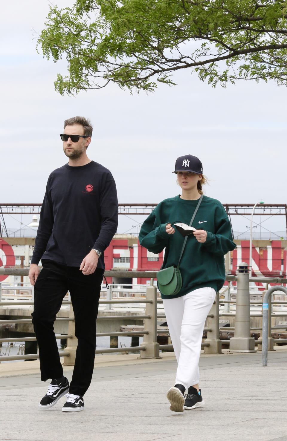 Jennifer Lawrence is seen out for a walk with husband, Cooke Maroney, by the Hudson River in NYC on May 24, 2021. (Photo: MEGA/GC Images)