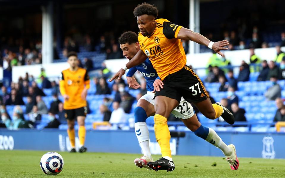 Adama Traore of Wolverhampton Wanderers battles for possession with Ben Godfrey - Getty Images