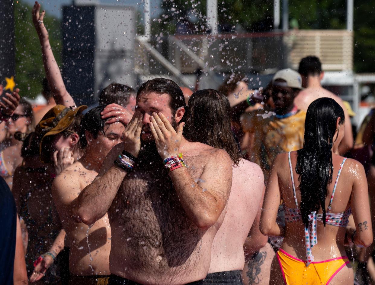 In this file photo, hundreds of people cool off in 90-degree heat at Bonnaroo in Manchester, Tenn., Friday, June 14, 2024. The Tennessee Valley and central parts of the U.S. are expected to see "anomalous" heat before the Northeast sees its first heat wave of 2024.