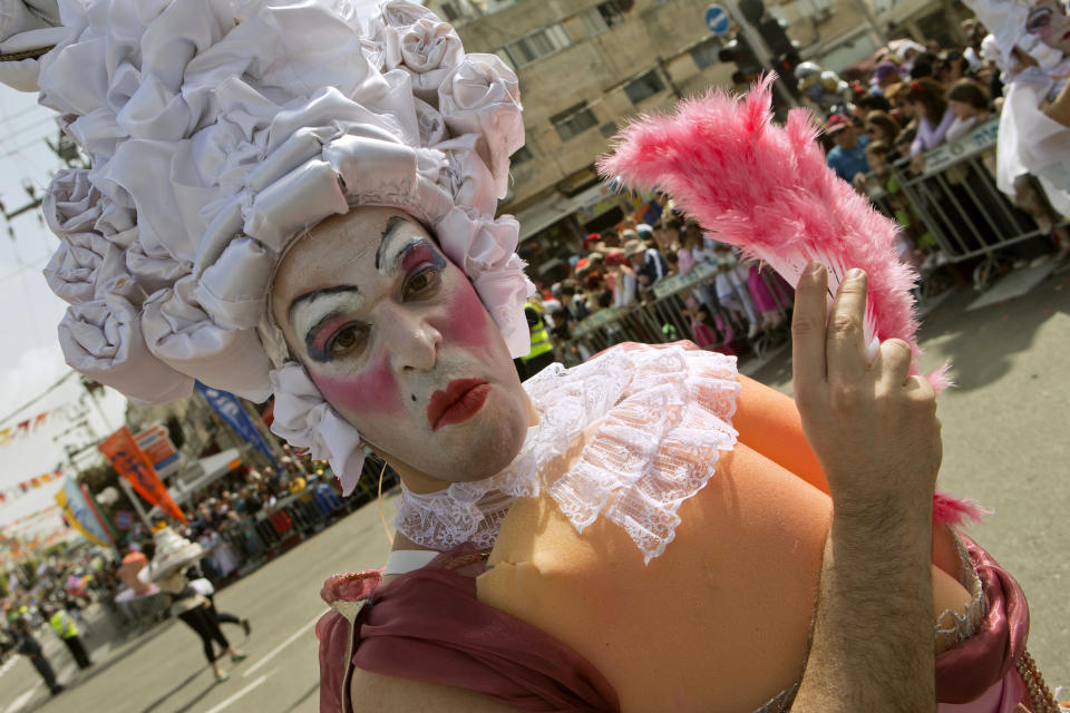 An Israeli man takes part in a parade to celebrate the Jewish holiday of Purim in the central Israeli city of Netanya on February 24, 2013. (Jack Guez/AFP/Getty Images)