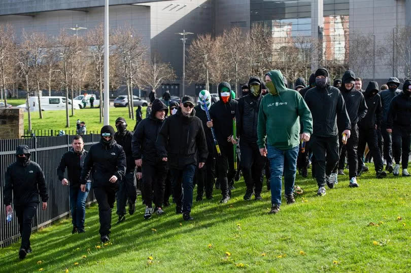 The Green Brigade and Bhoys ultras make their way to Parkhead.