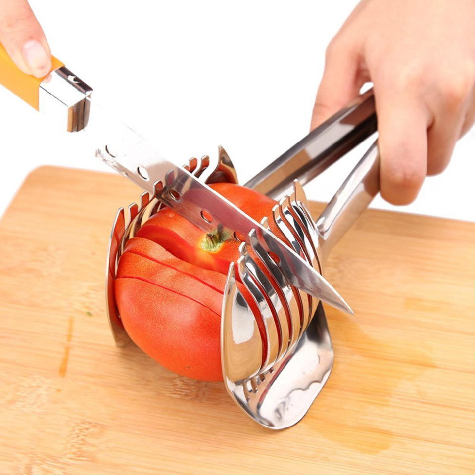 <p><a href="https://go.redirectingat.com?id=74968X1596630&url=https%3A%2F%2Fwww.walmart.com%2Fip%2FTomato-Slicer-Lemon-Cutter-Multipurpose-Handheld-Round-Fruit-Tongs-Stainless-Steel-Onion-Holder-Easy-Slicing-Kiwi-Fruits-Vegetable-Tools-Kitchen-Cutt%2F342099417&sref=https%3A%2F%2Fwww.redbookmag.com%2Fhome%2Fg44003011%2F9-weird-products-you-can-buy-on-sale-this-memorial-day%2F" rel="nofollow noopener" target="_blank" data-ylk="slk:Shop Now;elm:context_link;itc:0;sec:content-canvas" class="link ">Shop Now</a></p><p>Tomato Slicer</p><p>$10.99</p><p>walmart.com</p>