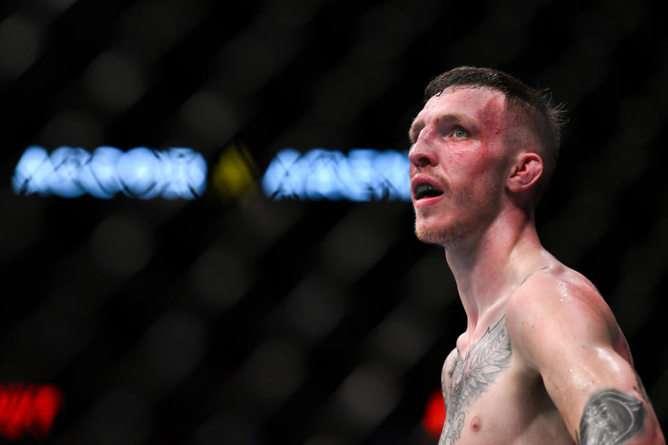 Sep 2, 2023; Paris, France; Ange Lossa (red gloves) fights Rhys McKee (blue gloves) during UFC Fight Night at Accor Arena. Mandatory Credit: Per Haljestam-USA TODAY Sports