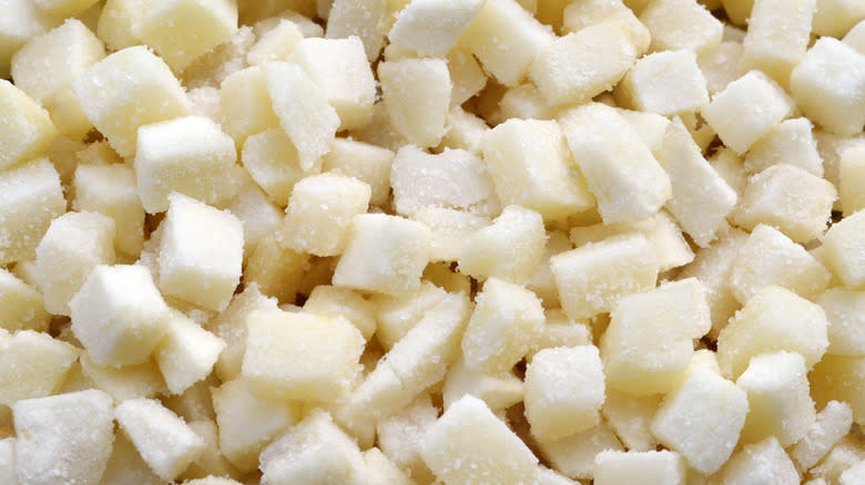 Frozen potato cubes as background