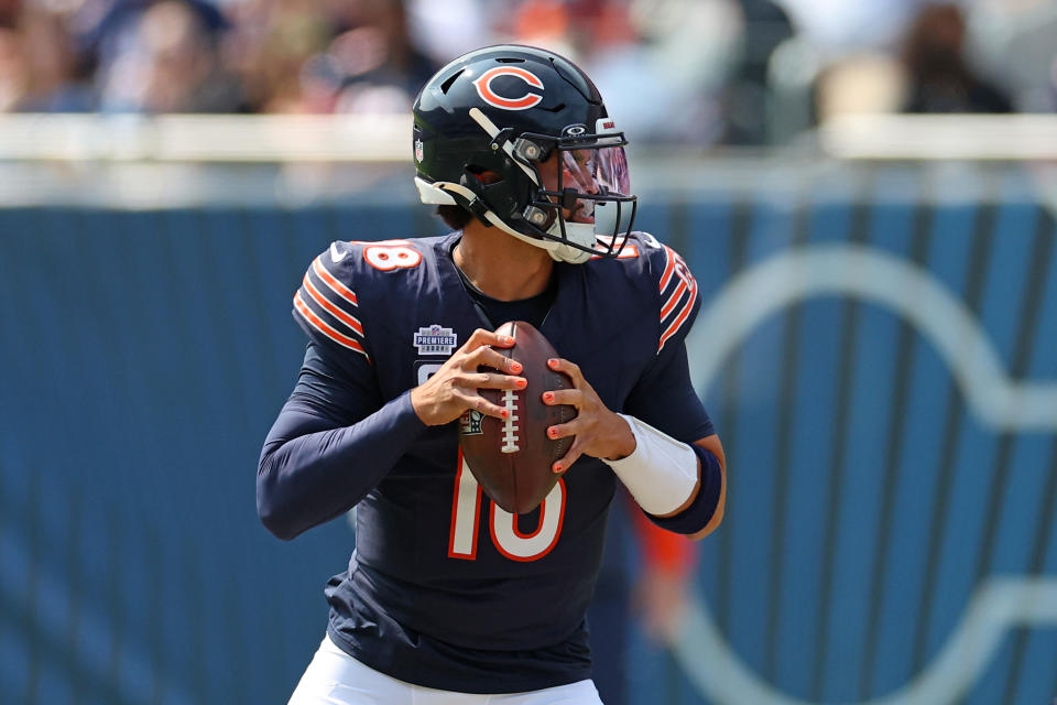 CHICAGO, ILLINOIS - SEPTEMBER 08: Caleb Williams #18 of the Chicago Bears looks to pass during a game against the Tennessee Titans at Soldier Field on September 08, 2024 in Chicago, Illinois.  The Bears defeated the Titans 24-17. (Photo by Stacy Revere/Getty Images)