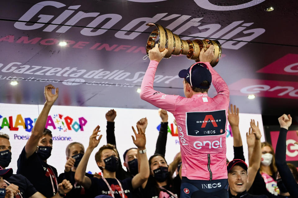 Britain’s Tao Geoghegan Hart celebrates with teammates after winning the Giro d'Italia cycling race, in Milan, Italy, Sunday, Oct. 25, 2020. In one of the most exciting final stages of a Grand Tour, British rider Tao Geoghegan Hart won the Giro d’Italia on Sunday, edging out Australian Jai Hindley by just 39 seconds. (Marco Alpozzi/LaPresse via AP)
