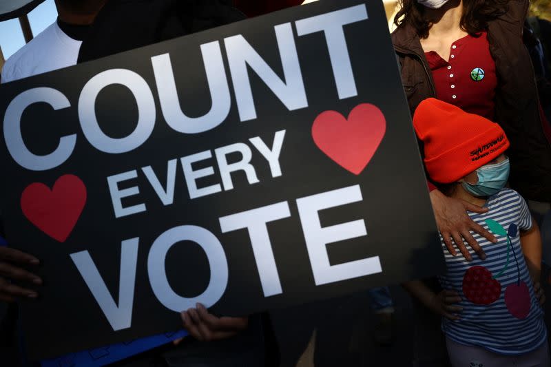 Supporters of Democratic U.S. presidential nominee Joe Biden gather at Black Lives Matter Plaza after Election Day in Washington