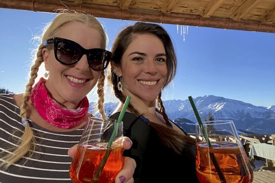 This undated image provided by Sanna Rameau, shows Ana Maria Knezevic, right, and Rameau. Spanish police are searching for Knezevic, a Colombian-American woman who went missing suddenly in Madrid. (Sanna Rameau via AP)