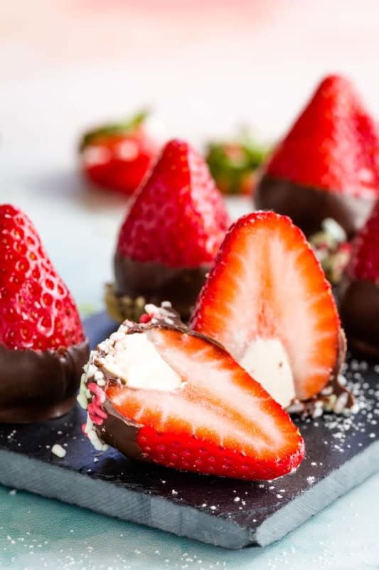 <p>Cupcakes & Kale Chips</p><p>Everybody loves chocolate dipped strawberries, but when they are stuffed with lightly sweetened cream cheese, they become a treat that nobody can resist.</p><p><strong>Get the recipe: <a href="https://cupcakesandkalechips.com/chocolate-covered-cheesecake-strawberries-june-reciperedux/" rel="nofollow noopener" target="_blank" data-ylk="slk:Chocolate-Covered Cheesecake Strawberries;elm:context_link;itc:0;sec:content-canvas" class="link ">Chocolate-Covered Cheesecake Strawberries</a></strong></p>