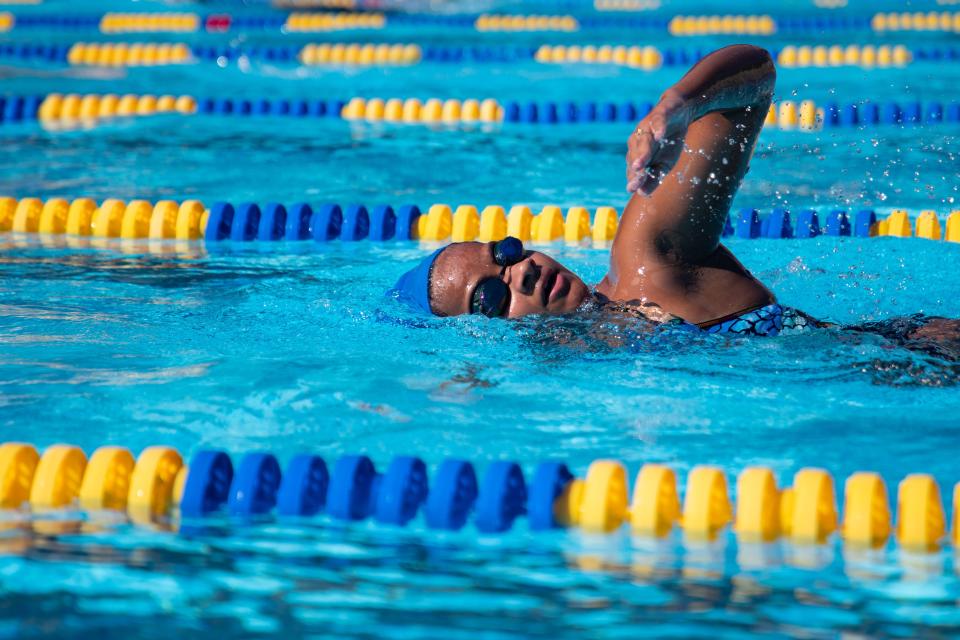Shania Brown swims in lane two during the Godby High School swim team practice at Jack L. McClean Community Center on Wednesday, Oct. 5, 2022.