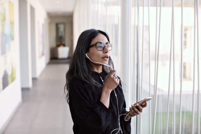 woman speaking with handsfree