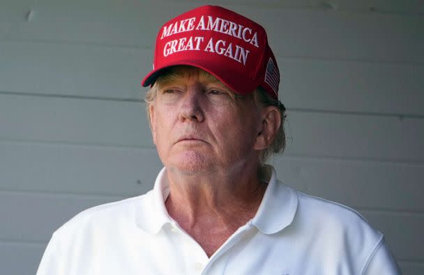 PHOTO: Former President Donald Trump watches the first round of the LIV Golf Tournament at Trump National Golf Club, May 26, 2023, in Sterling, Va. (Alex Brandon/AP)