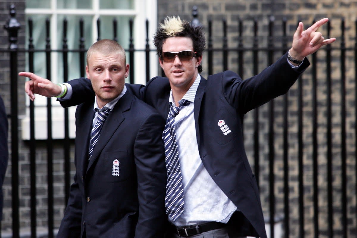 England cricketers Andrew Flintoff, left, and Kevin Pietersen arrive at Downing Street following the Ashes victory parade in London in 2005 (Mark Lees/PA) (PA Archive)