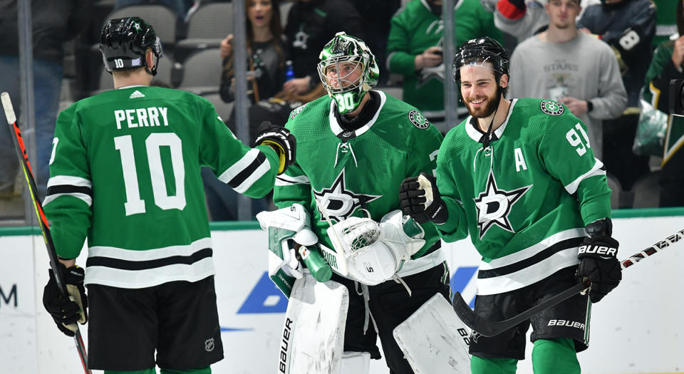 DALLAS, TX - NOVEMBER 25: Ben Bishop #30 of the Dallas Stars is congratulated on a win against the Vegas Golden Knights at the American Airlines Center on November 25, 2019 in Dallas, Texas. (Photo by Glenn James/NHLI via Getty Images)