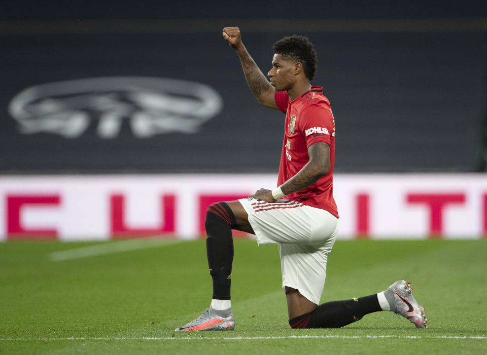 Manchester United's Marcus Rashford of Manchester United takes a knee in support of the 'Black Lives Matter' - an image seen at every Premier League match since the league's restart