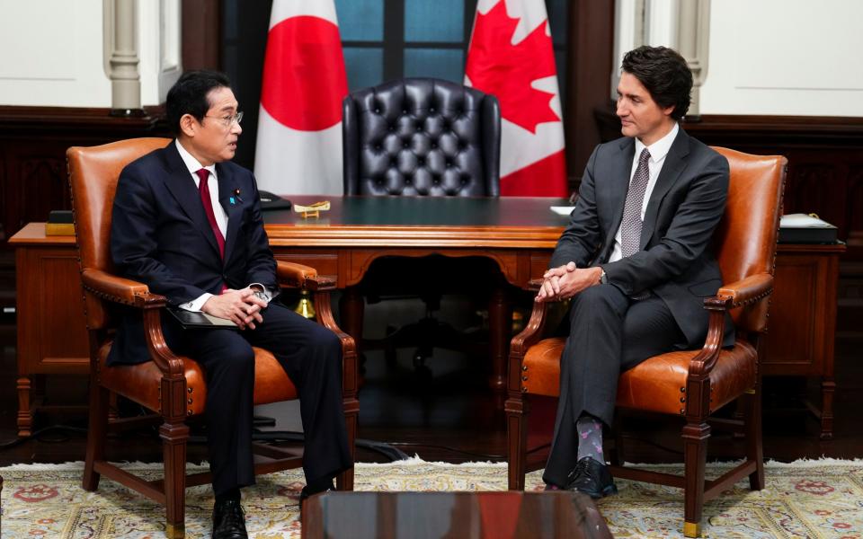 Fumio Kishida, seen here meeting Justin Trudeau, the Canadian prime minister, on Thursday, is touring G7 countries - Sean Kilpatrick/The Canadian Press via AP