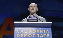 FILE - In this June 2, 2019, file photo, Rusty Hicks speaks during the 2019 California Democratic Party State Organizing Convention in San Francisco. California Democratic leaders are being criticized after attempting to link the insurrection at the U.S. Capitol with efforts to recall Democratic Gov. Gavin Newsom. State Democratic Party Chair Hicks led a group of Democratic officials who described the effort to remove Newsom as a “coup” and claimed, without evidence, that those involved were far-right extremists. (AP Photo/Jeff Chiu, File)