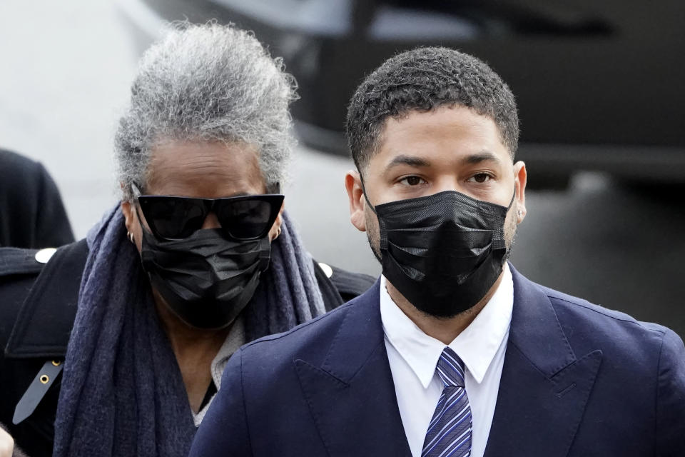 Actor Jussie Smollett arrives with his mother Monday, Nov. 29, 2021, at the Leighton Criminal Courthouse for jury selection at his trial in Chicago. Smollett is accused of lying to police when he reported he was the victim of a racist, anti-gay attack in downtown Chicago nearly three years ago. (AP Photo/Charles Rex Arbogast)