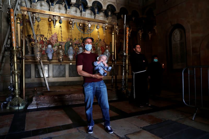 Church of the Holy Sepulchre reopens its doors following the easing of novel coronavirus restrictions, in Jerusalem's Old City