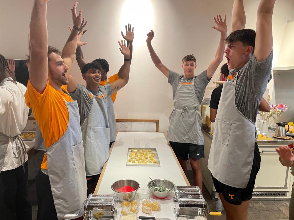 Tennessee basketball players, including Santiago Vescovi, Kaylan Makan, Cade Phillips and JP Estrella from left to right, took part in a cooking class in Florence, Italy on Saturday.