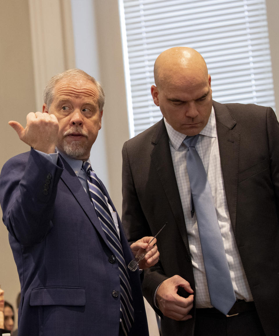 Prosecutor Creighton Waters talks with John Conrad in the double murder trial of Alex Murdaugh at the Colleton County Courthouse in Walterboro, S.C., Wednesday, Feb. 1, 2023. (Andrew J. Whitaker/The Post And Courier via AP, Pool)