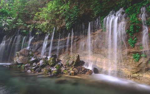 Chorros de la Calera waterfalls, on the Ruta de la Flores - Credit: TRAVELPHOTOS - STOCK.ADOBE.COM