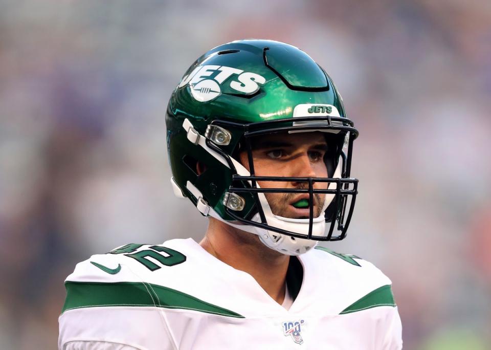 EAST RUTHERFORD, NEW JERSEY – AUGUST 08: Thomas Hennessy #42 of the New York Jets looks on before the game against the New York Giants during a preseason matchup at MetLife Stadium on August 08, 2019 in East Rutherford, New Jersey. (Photo by Elsa/Getty Images)