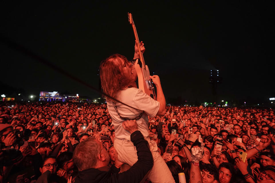 Lee Kiernan of Idles performs during the Corona Capital music festival in Mexico City, Sunday, Nov. 20, 2022. (AP Photo/Eduardo Verdugo)