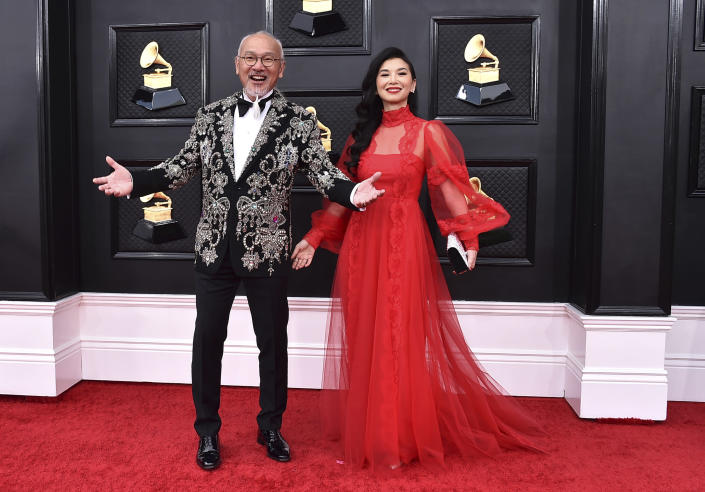 Hai Nguyen, left, and Sangeeta Kaur arrive at the 64th Annual Grammy Awards at the MGM Grand Garden Arena on Sunday, April 3, 2022, in Las Vegas. (Photo by Jordan Strauss/Invision/AP)