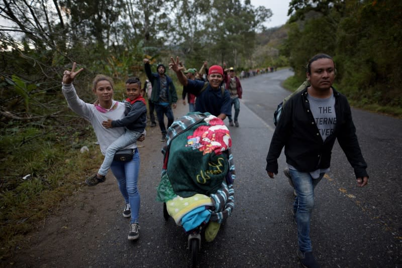 Hondurans take part in a caravan of migrants heading toward the U.S., in Chiquimula